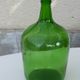 Dark green glass demijohn, vintage