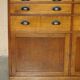 Antique English Art Deco furniture in hand-carved oak, 26 drawers.