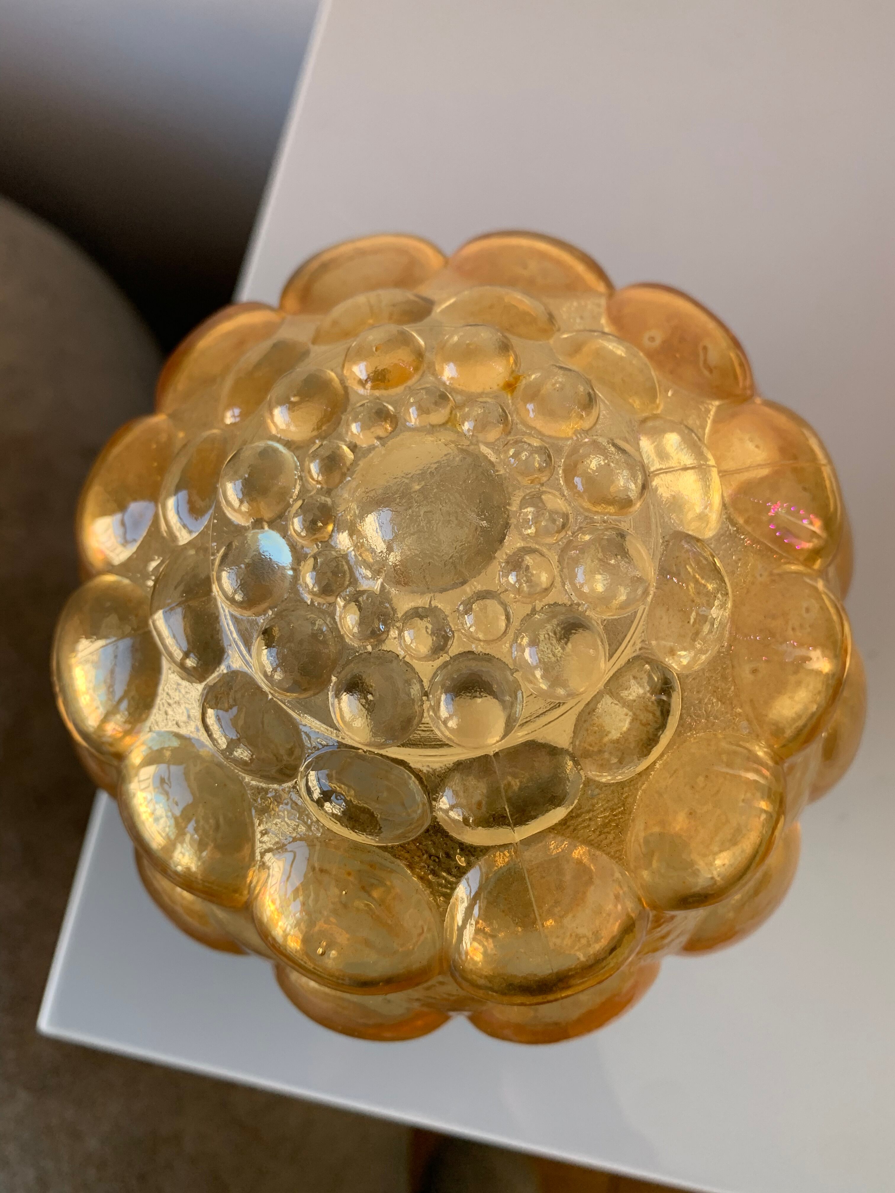 Old vintage table lamp made of amber molded glass