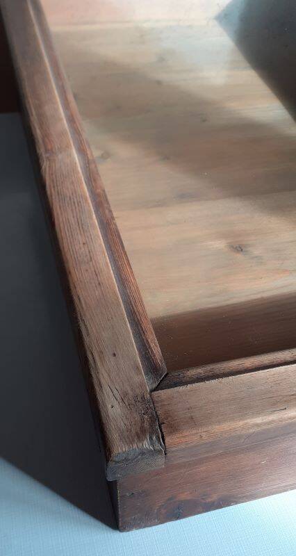Old sloping pine display case