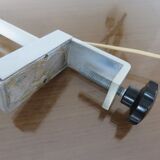 Eye ball lamp stapled on a chrome hose 70s