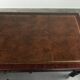 Antique English writing desk from the late 19th century with a warm colour