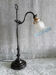 Adjustable lamp in painted metal with frosted glass tulip