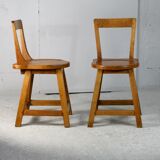 Pair of brutalist wooden back stools. France, circa 1960