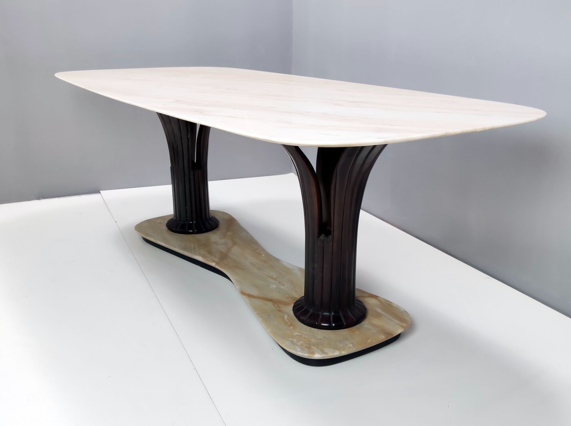 Dining table with a portuguese pink marble top