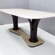 Dining table with a portuguese pink marble top