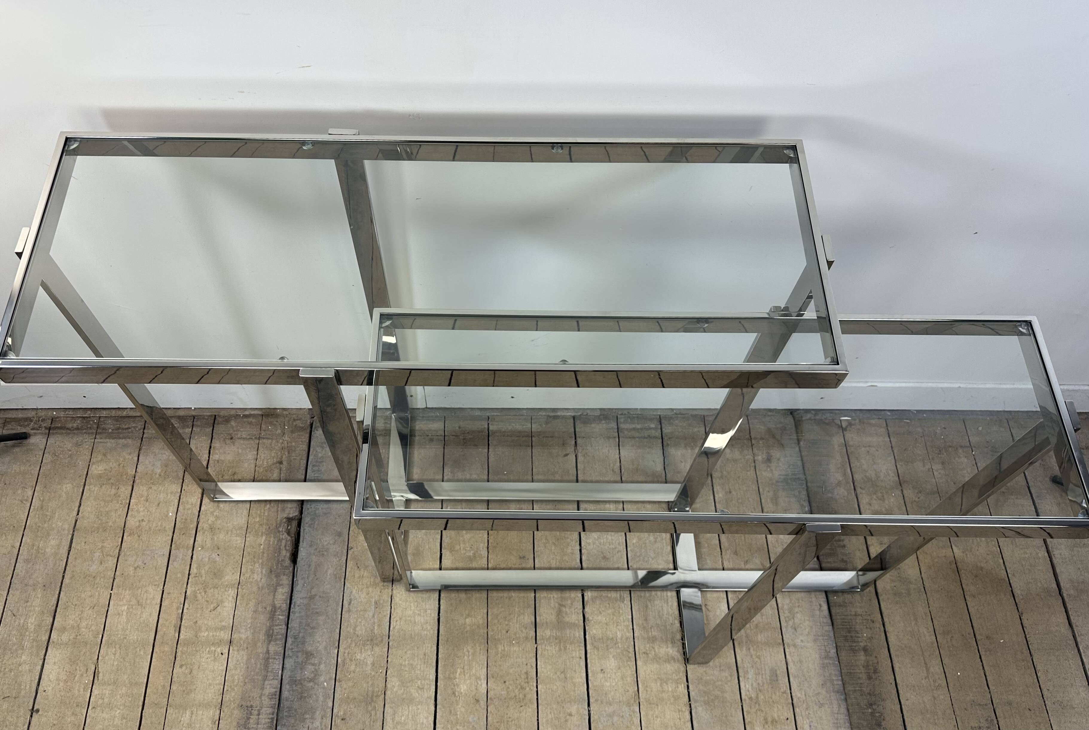 Chrome metal and glass console from the 2000s.