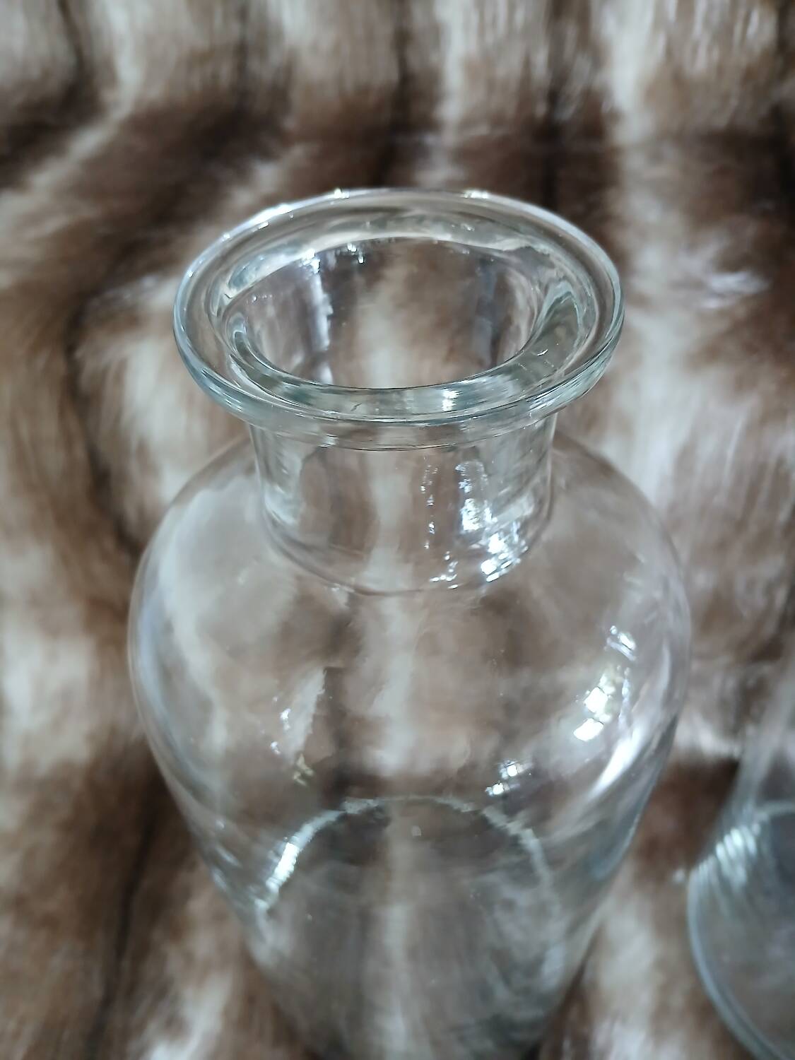 2 large antique transparent glass bottles