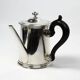 Christofle teapot in silver-plated metal, with a blackened wood handle — late 19th century, early 20th century.