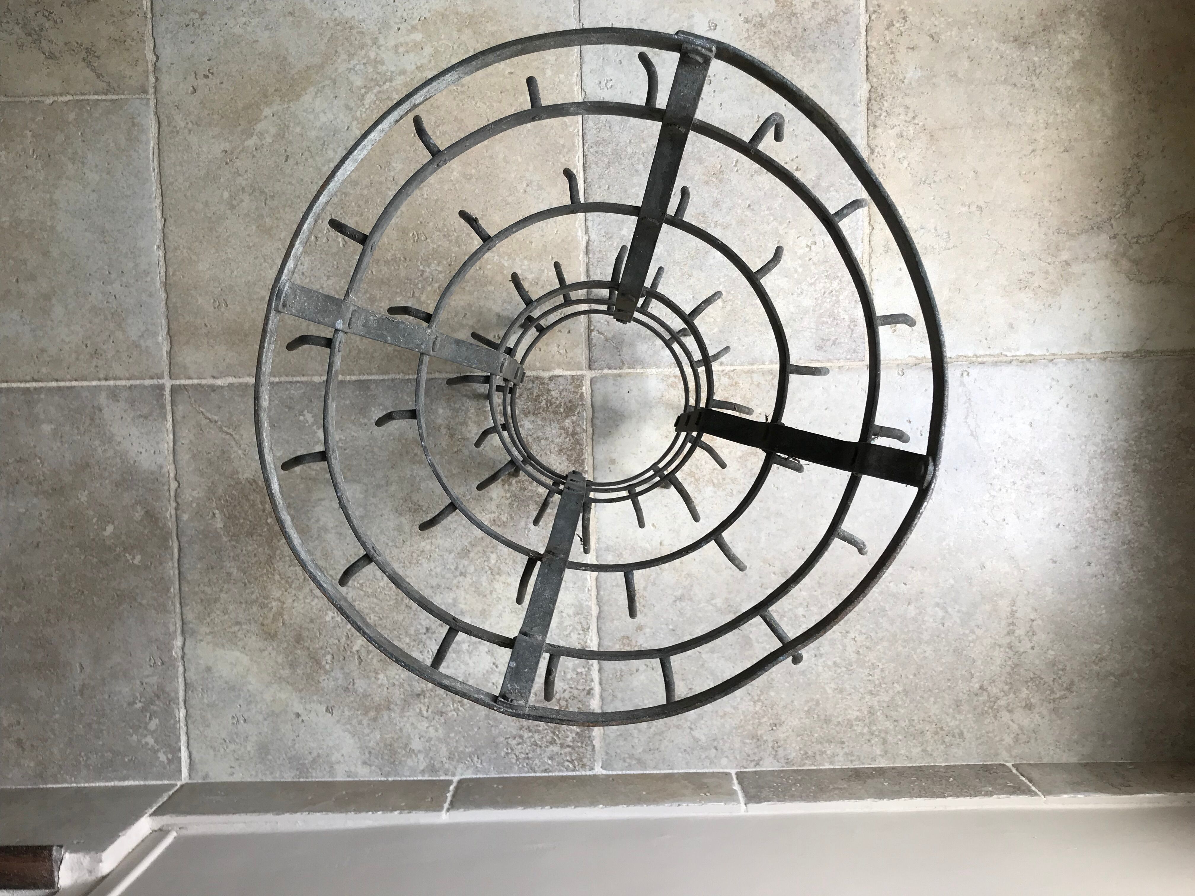 Old metal hedgehog bottle holder