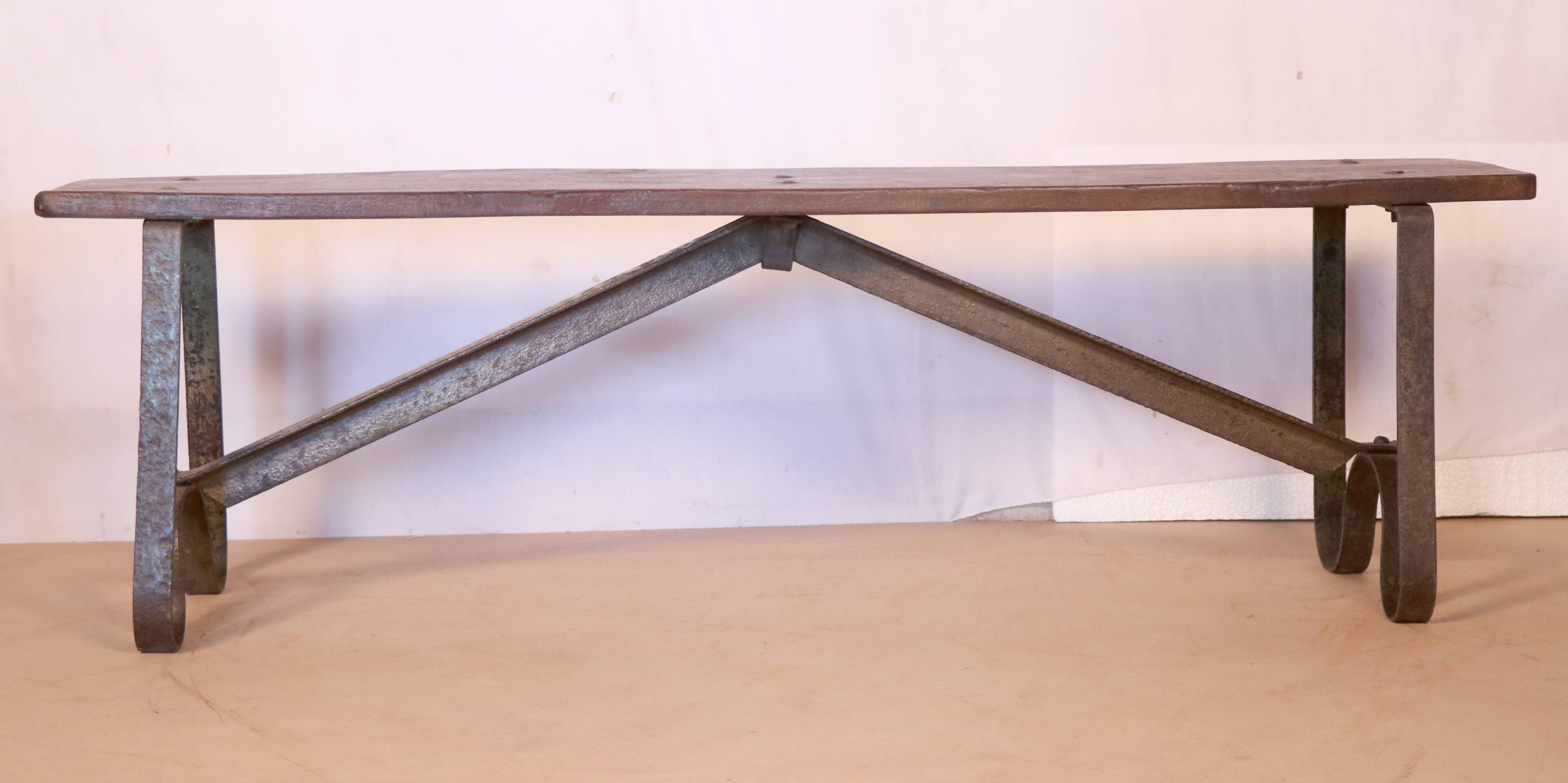 Old Burmese teak bench and wrought iron base