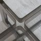 Smoked glass coffee table, brushed stainless steel base, 1970s.