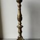 Gilded bronze candlestick with cherub trio decoration