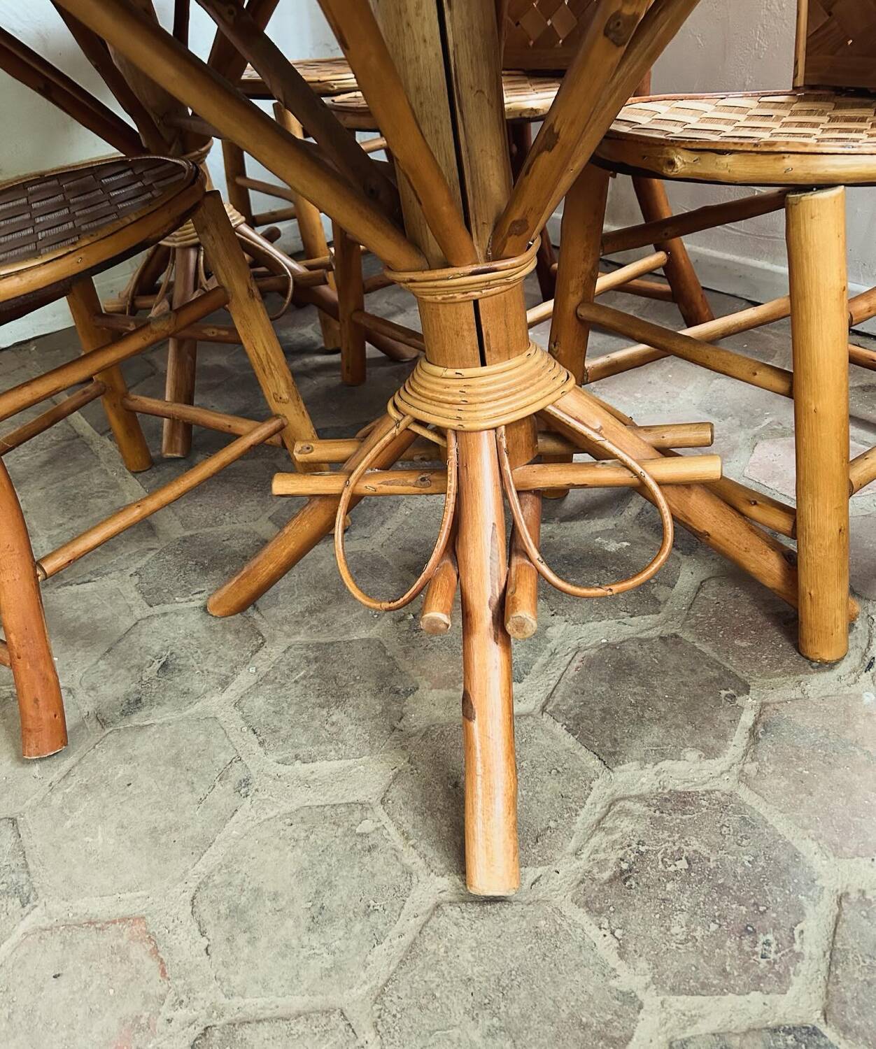 Table and chairs in woven chestnut