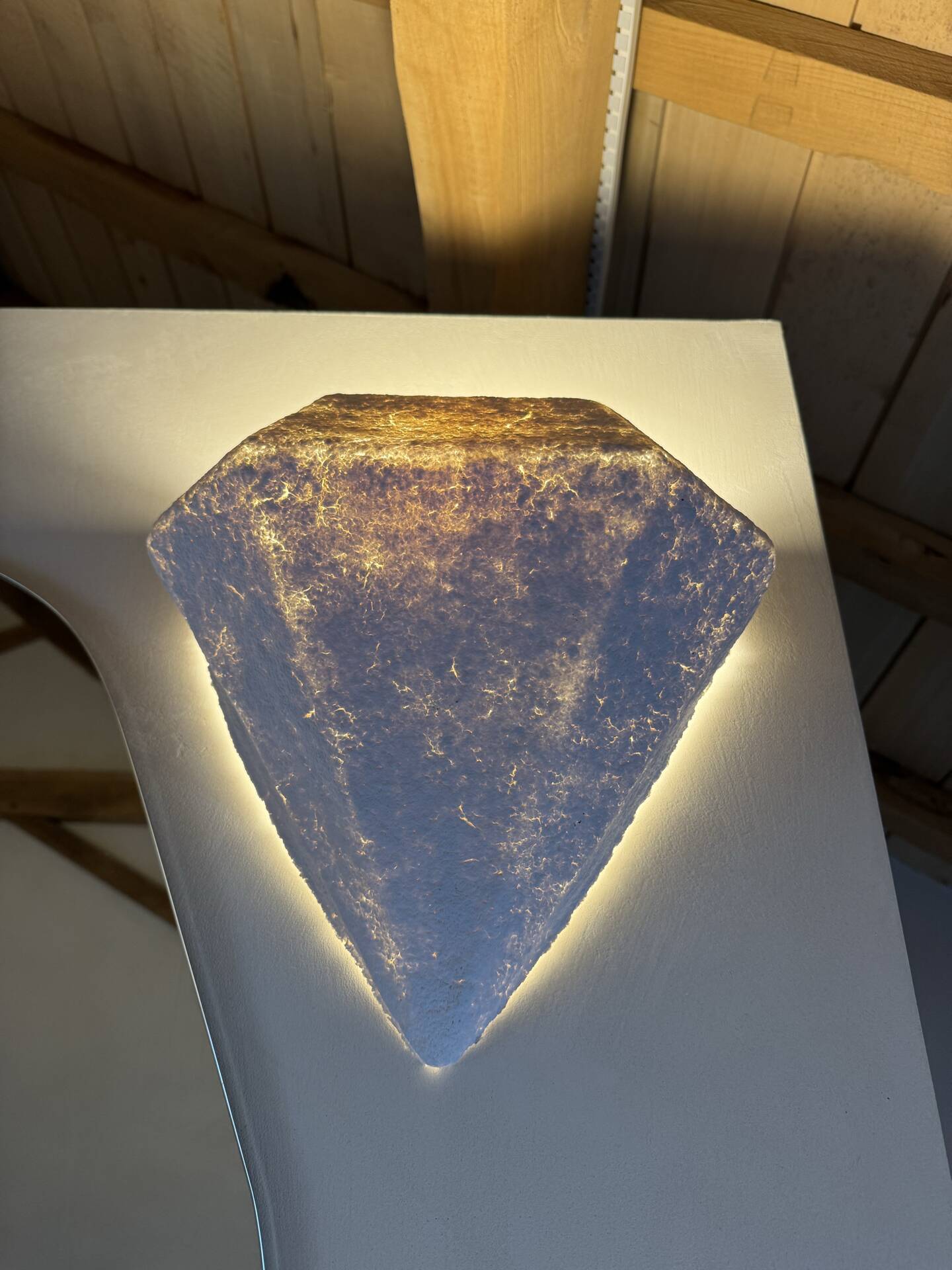 Vintage habitat diamond-shaped papier-mâché wall lights.