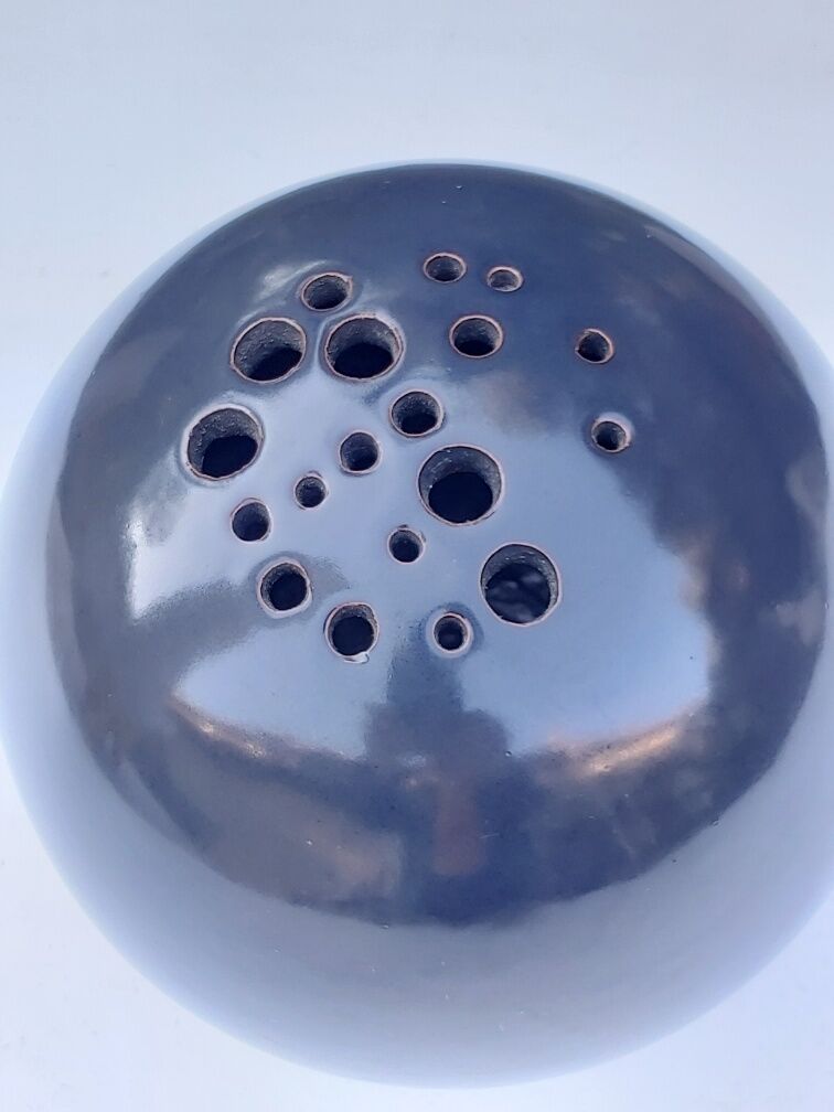 Signed ceramic flower-picker ball