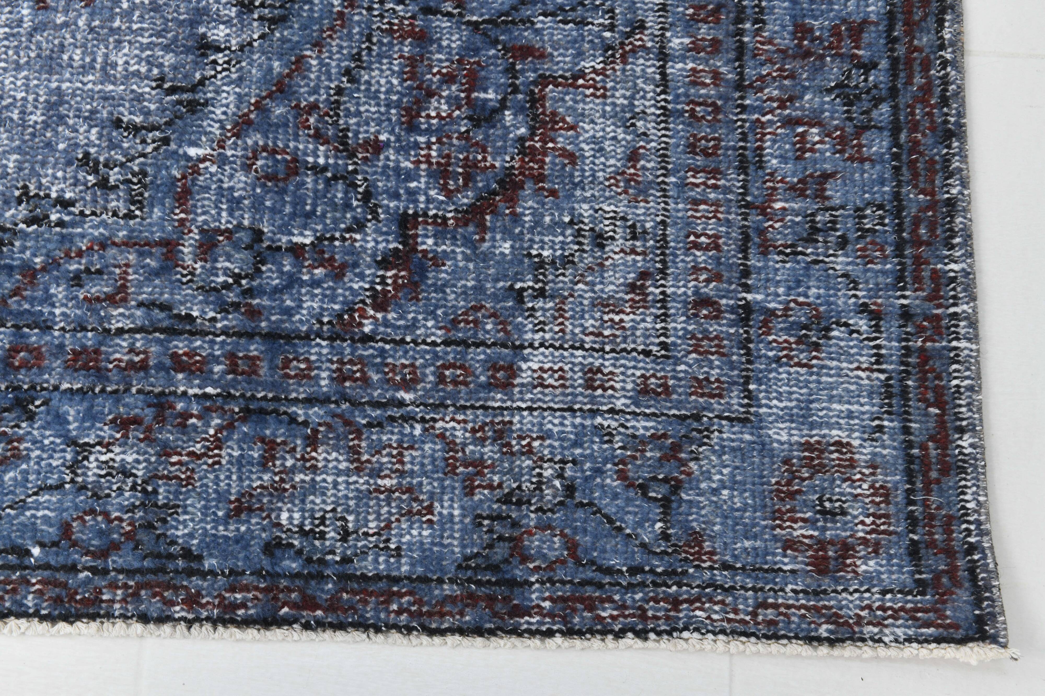 Tapis vintage en laine bleue