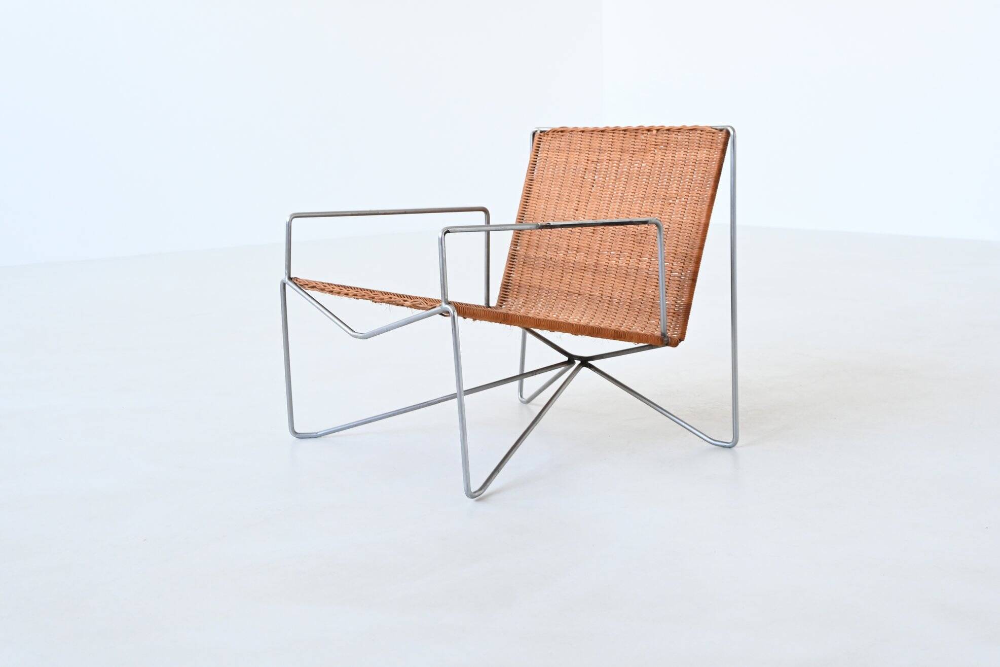 Pair of lounge chairs steel and rattan Gelderland The Netherlands 1964