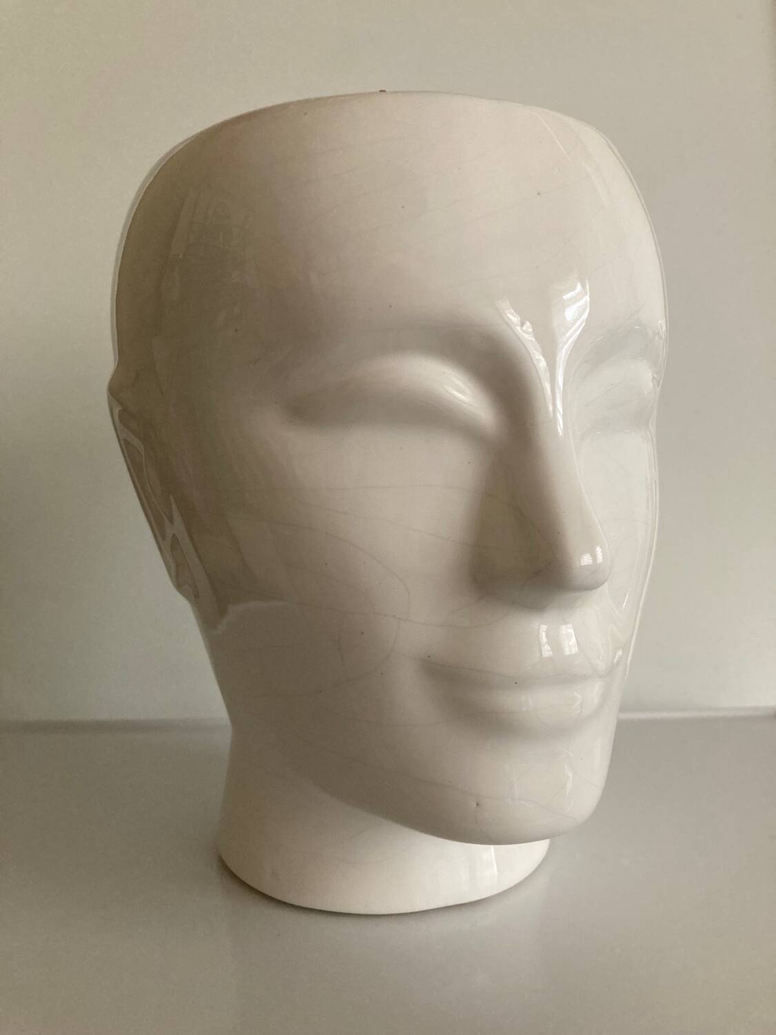 Vintage white ceramic face-shaped vase or planter