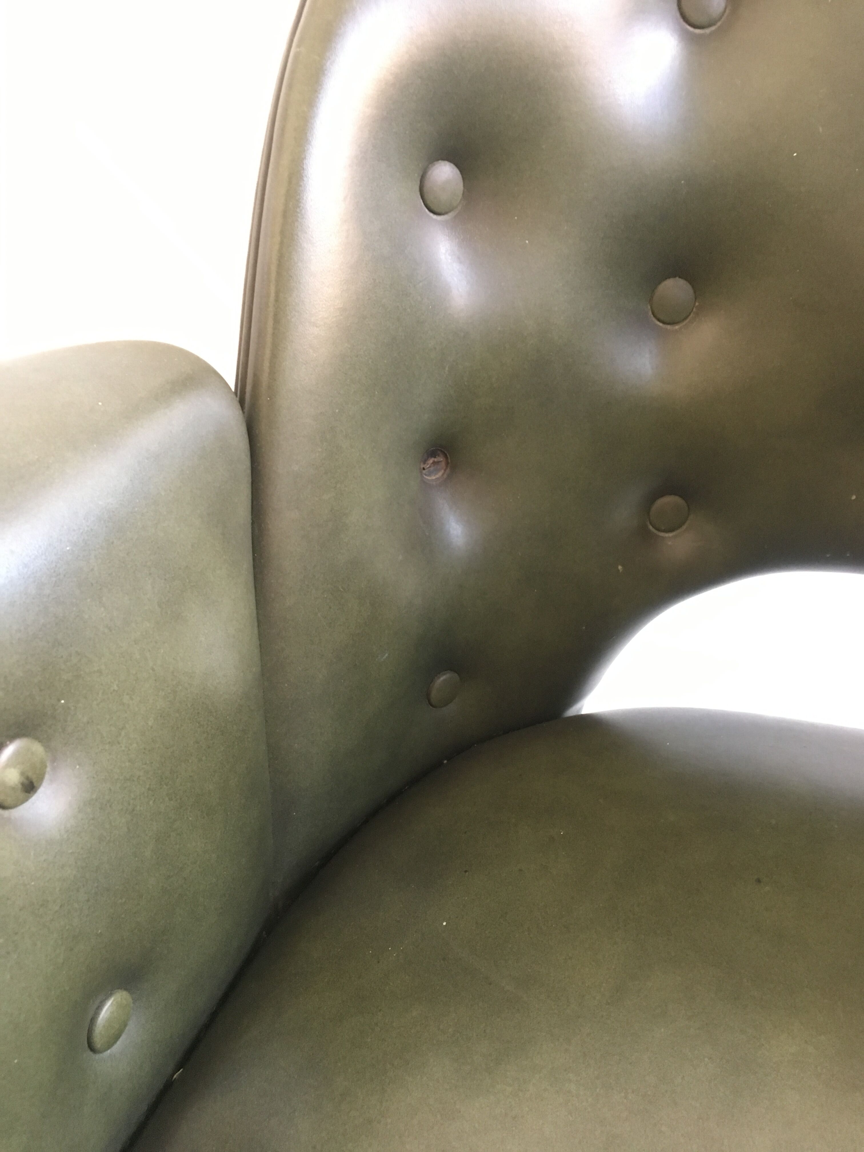 Chair in bottle green leatherette