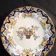 Decorative earthenware plate from Rouen 20th century