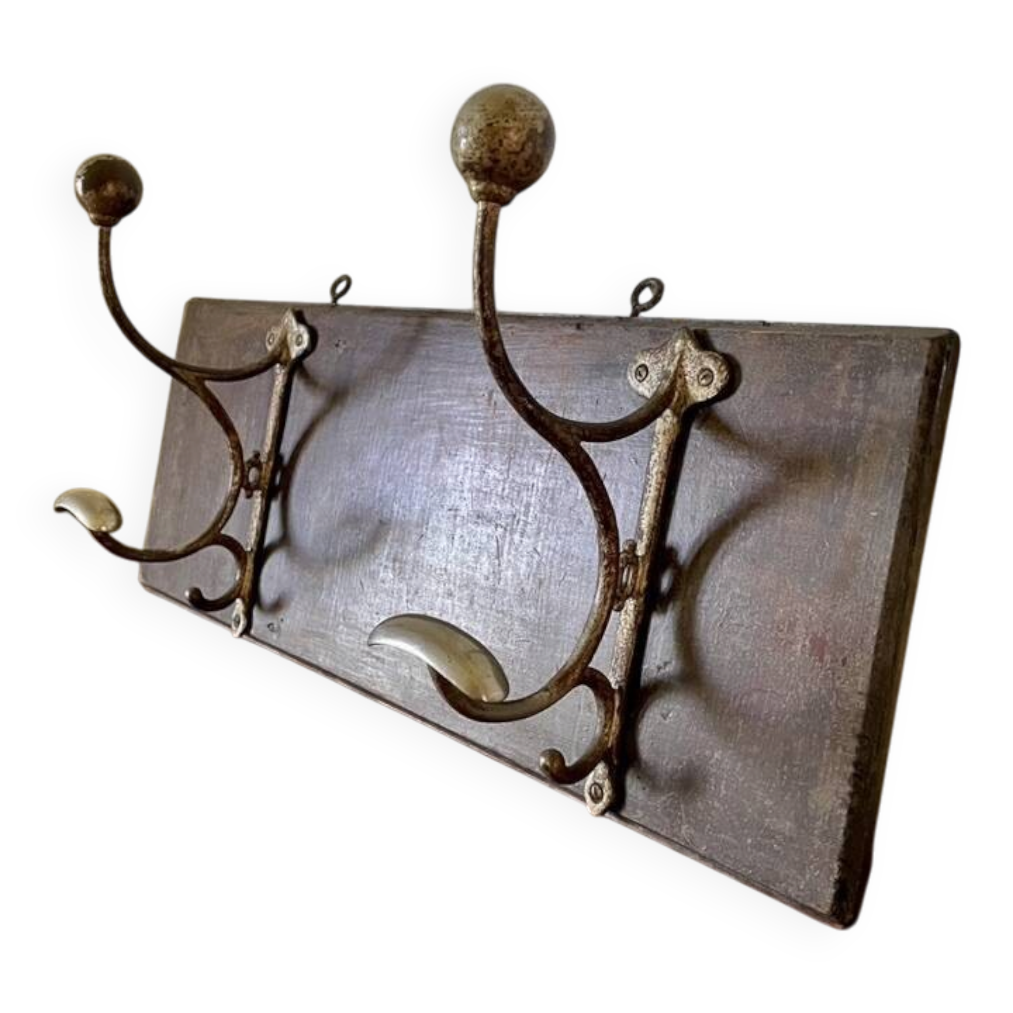 Patinated wood and metal coat rack from the 1950s.