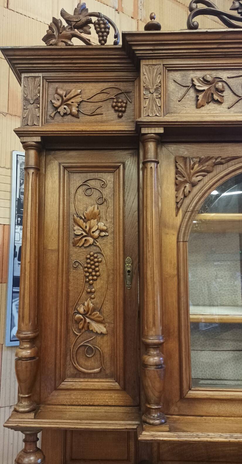 Art Nouveau buffet in carved oak with vine decoration