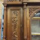 Art Nouveau buffet in carved oak with vine decoration