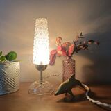 Retro chic bedside lamp with a diamond tip.