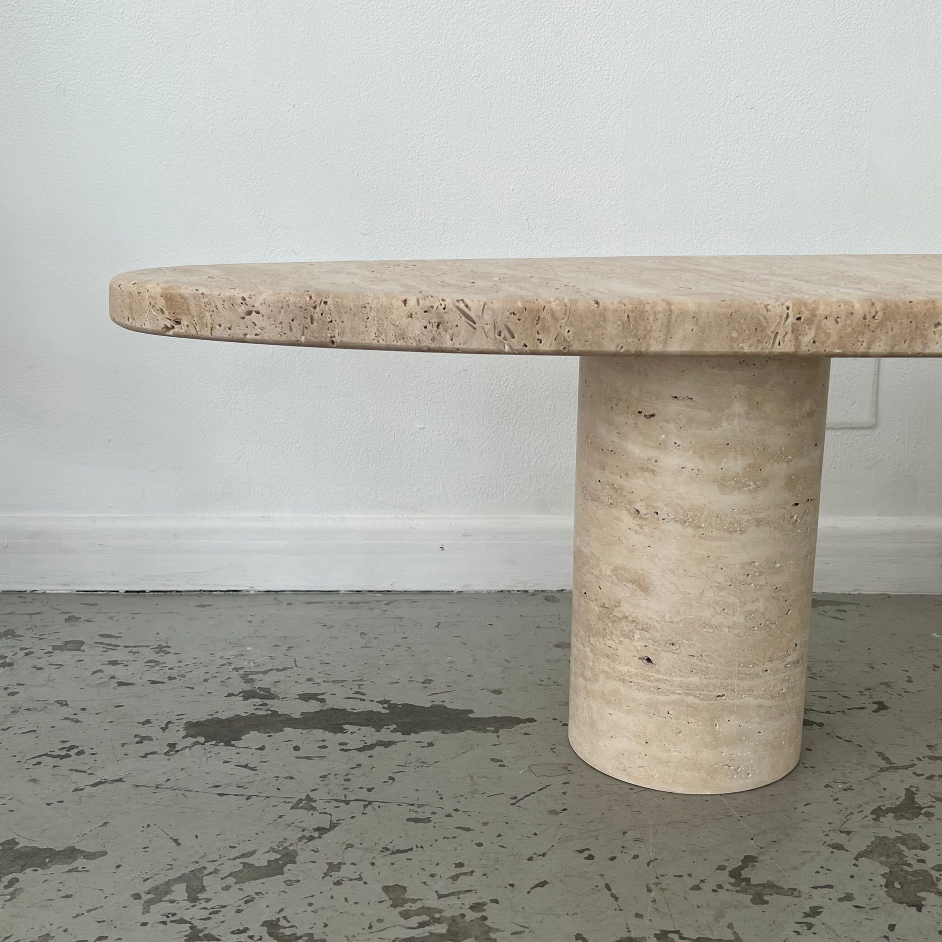 Oval travertine coffee table
