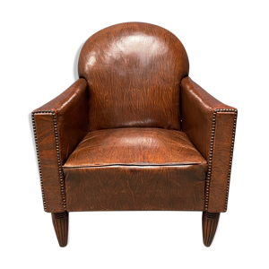 fauteuil club art déco en cuir de france, début des années 1900.