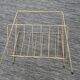 Vintage gold-tone metal magazine rack