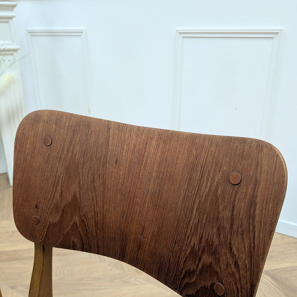 Set of 4 Danish chairs in teak and black faux leather, 1960s.