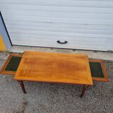 English wood coffee table with leather shelves