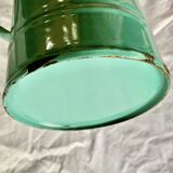 Vintage pitcher in green enameled sheet metal