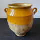Old yellow glazed terracotta grease pot south west France