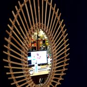 Oval shaped sun mirror in vintage rattan 1960/1970