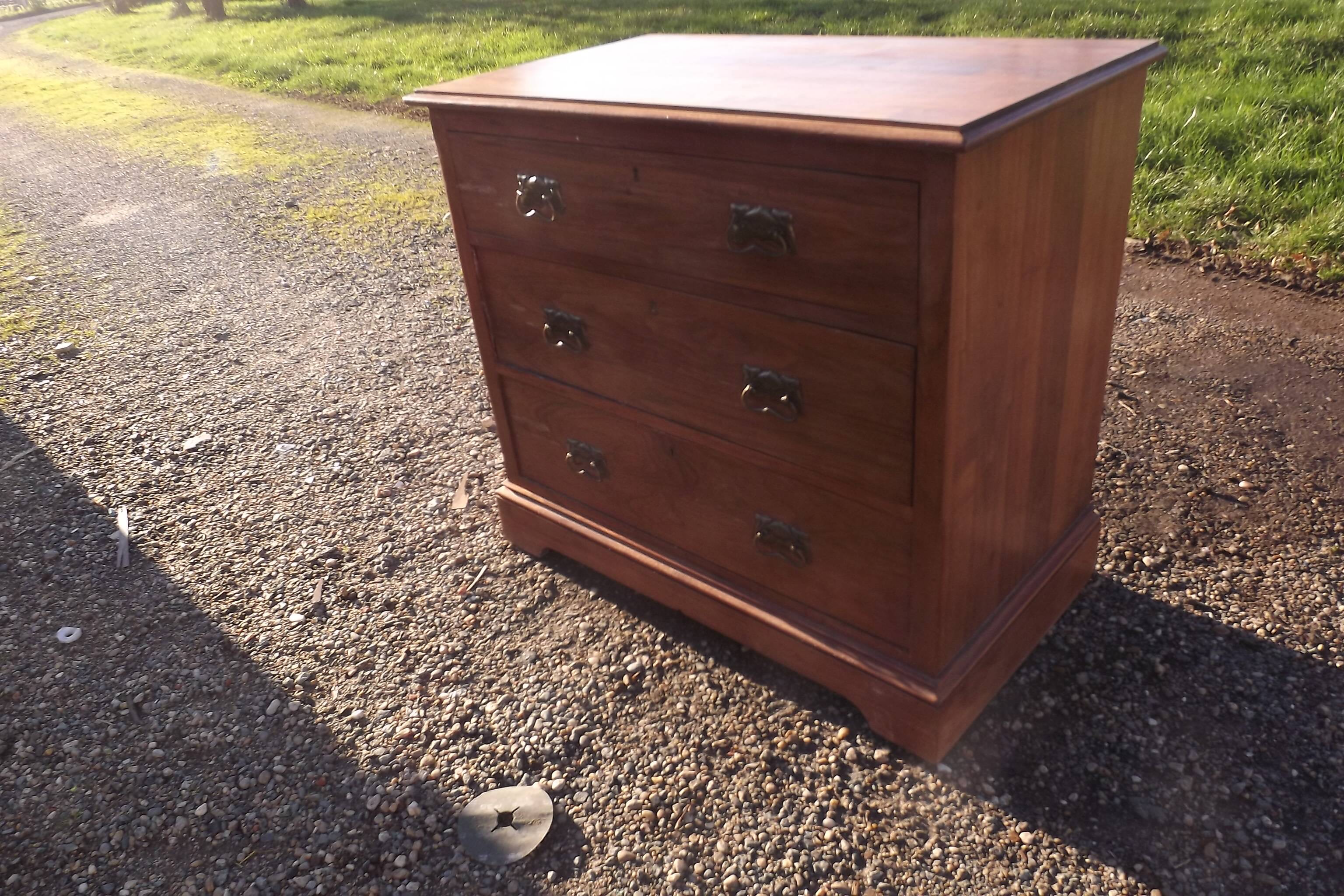 3 drawer chest of drawers walnut and brass