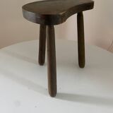 Antique tripod farm stool in brutalist style