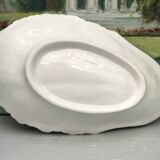 Scallop-shaped pocket emptier