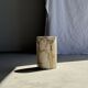 Small white petrified wood side table with black inlay H28 D18 -