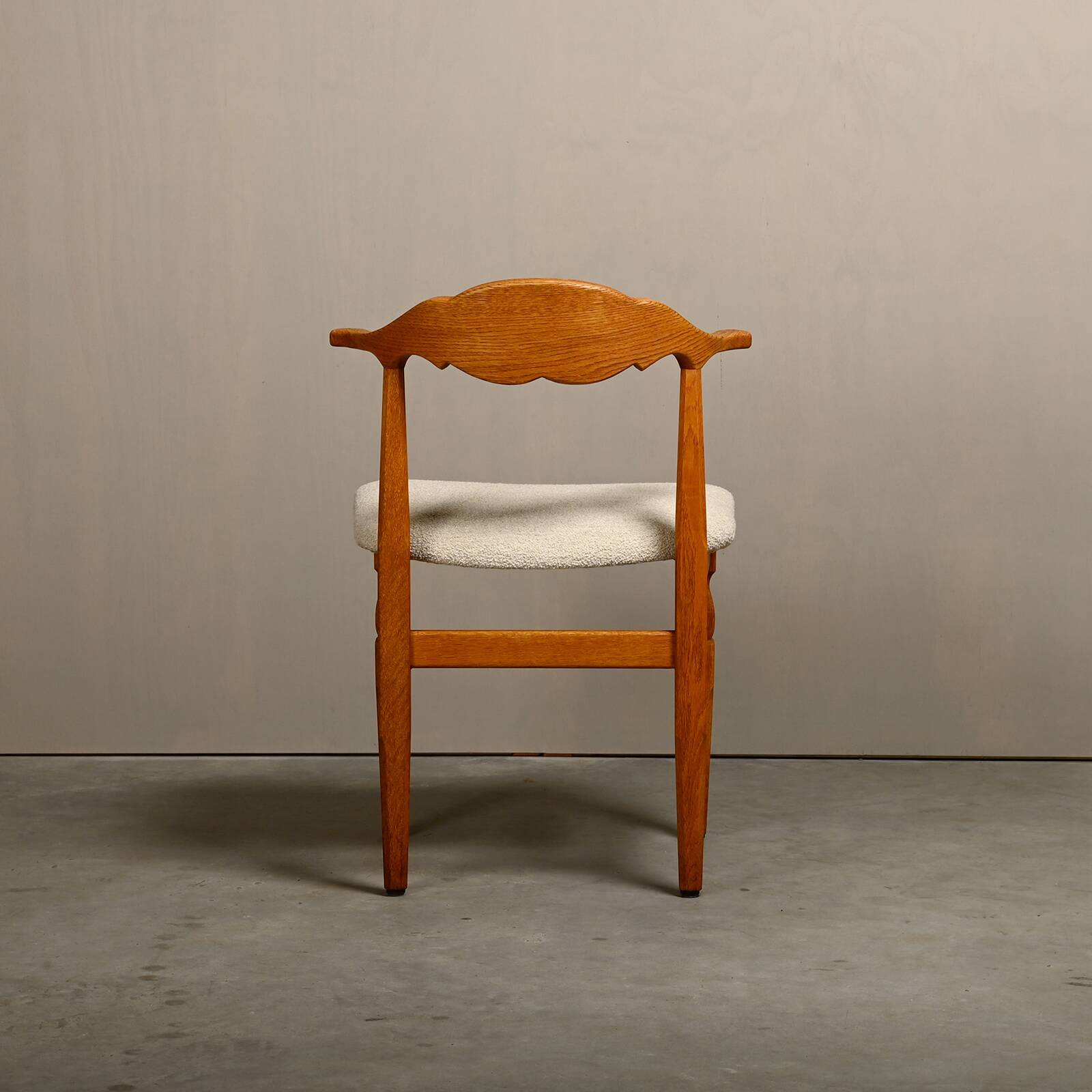 Henning Kjærnulf dining chairs set in Oak and Off White Bouclé, Denmark, 1960s