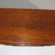 Wooden jewelry box in the shape of a dresser