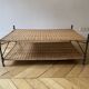 wrought iron and wicker coffee table