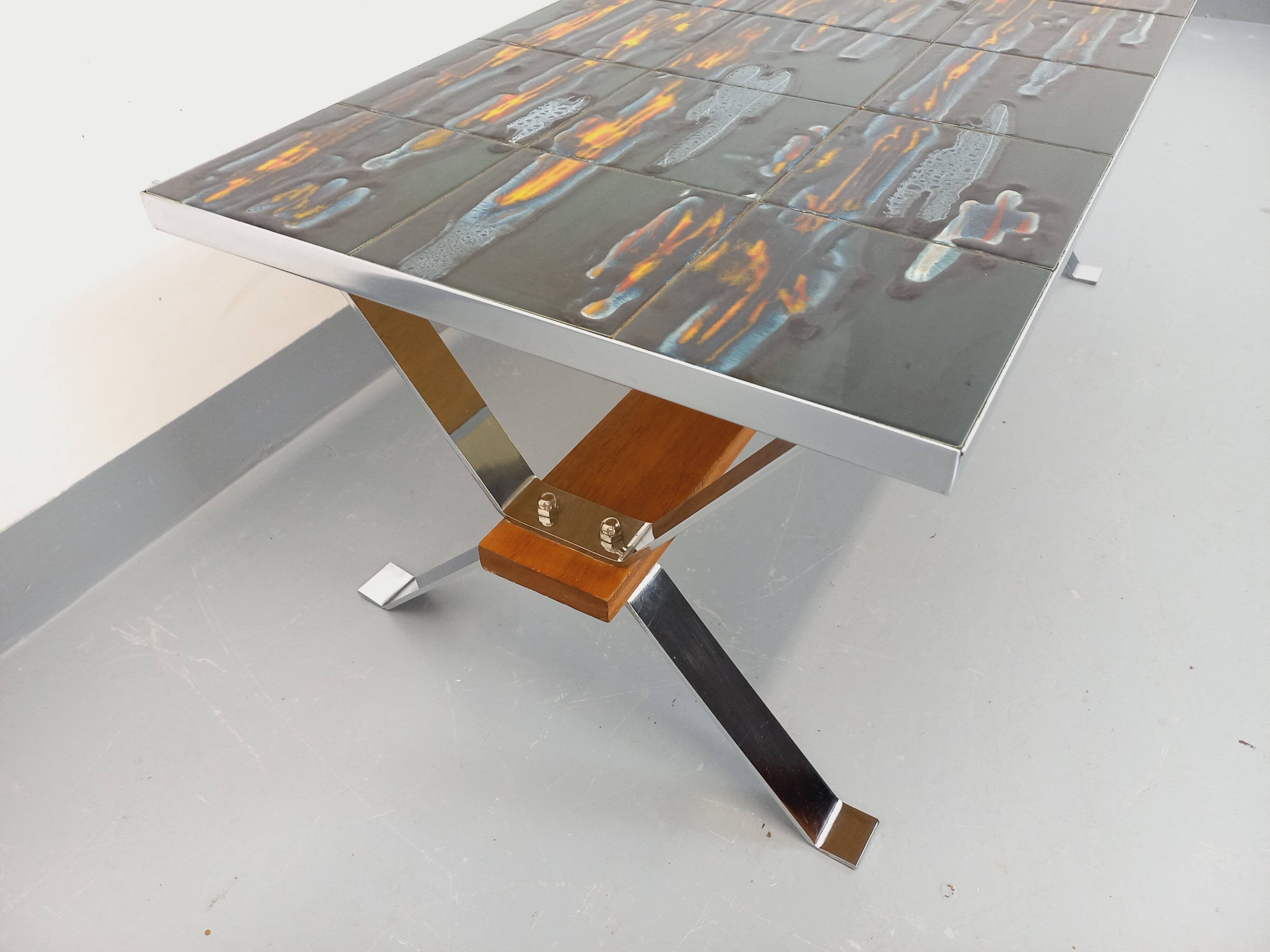 Vintage coffee table from the 60s and 70s in ceramic, chrome metal, and wood.