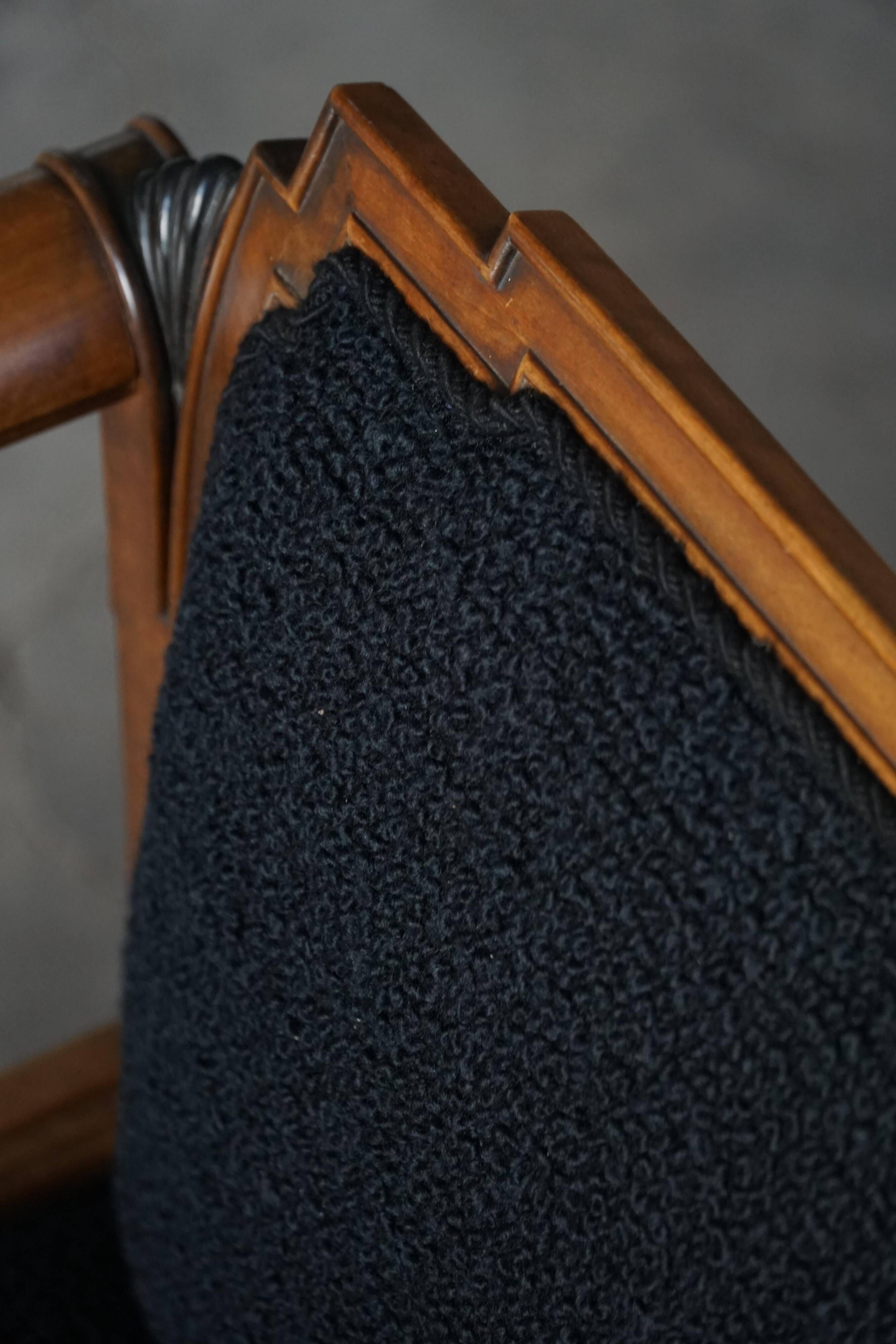 Early 20th century Danish Art Nouveau armchair, reupholstered in charcoal boucle.