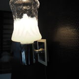 Torch type wall lamp in transparent and white glass