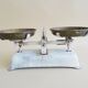 Antique kitchen scales from a record to five kilos, white beam scales with brass plates
