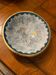 Enamelled cup