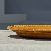 Antique oval dish, yellow-orange, frieze border L:24